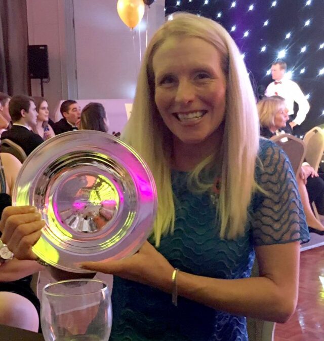 Lizzie Harris with the Champion Pointer Trophy